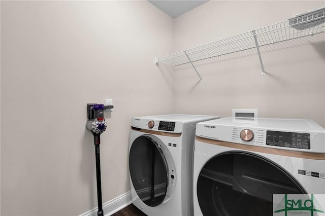 washroom with washer and dryer