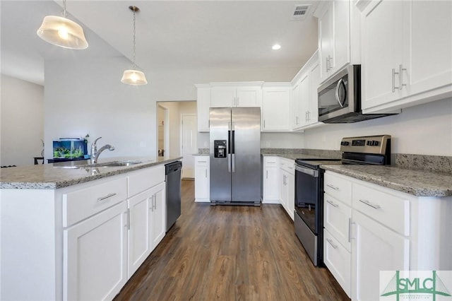 kitchen with sink, decorative light fixtures, appliances with stainless steel finishes, dark hardwood / wood-style flooring, and white cabinets