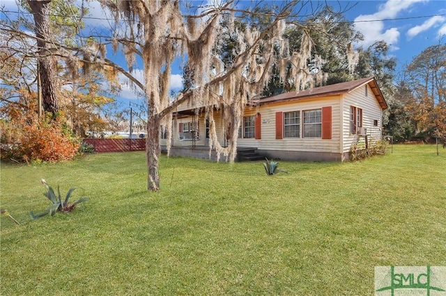 view of front facade with a front yard