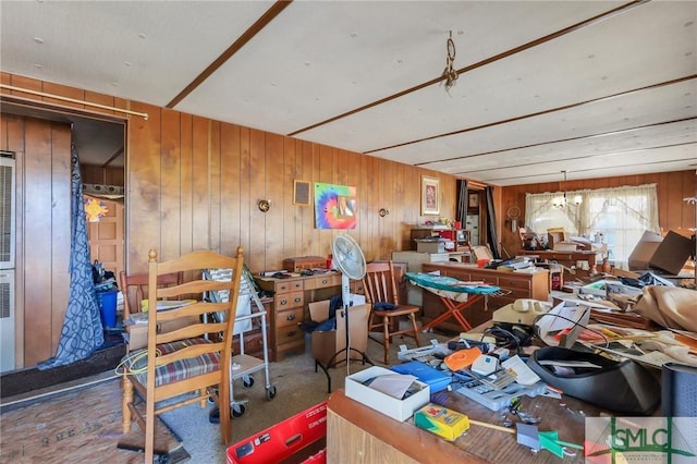 miscellaneous room featuring wood walls