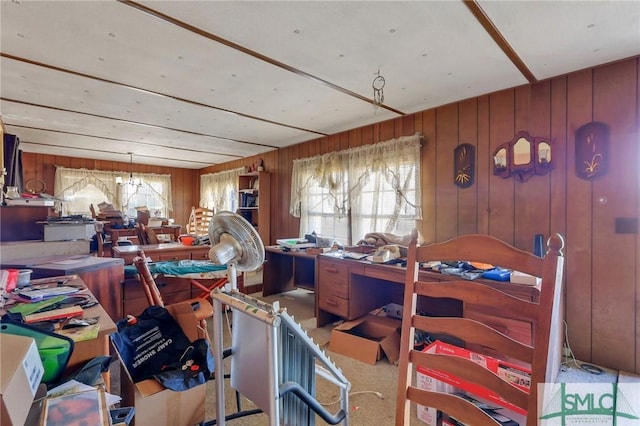 misc room featuring a wealth of natural light and wooden walls