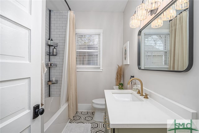 full bathroom with vanity, toilet, tile patterned flooring, and shower / tub combo