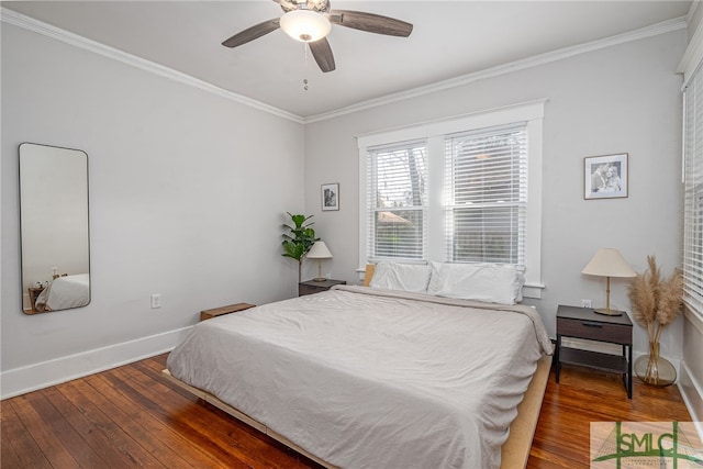 bedroom with hardwood / wood-style flooring, ceiling fan, and crown molding