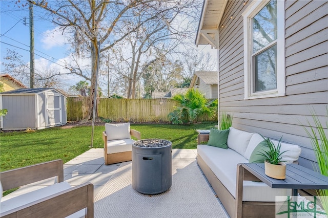 view of patio featuring a shed and an outdoor hangout area