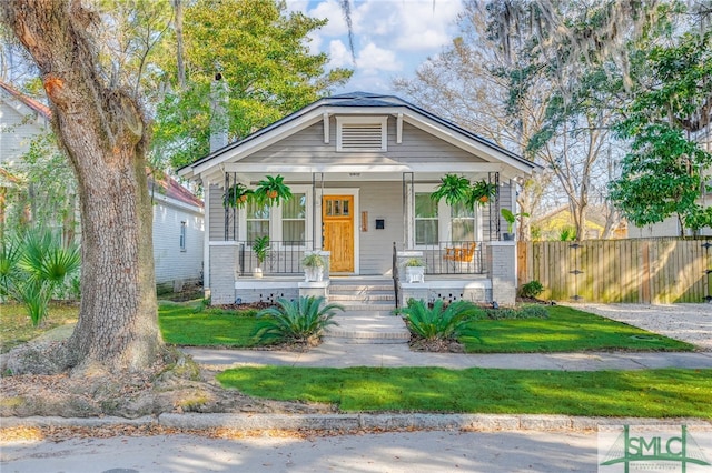 bungalow-style home with a porch