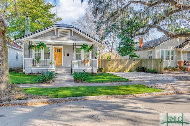 bungalow-style home with a porch