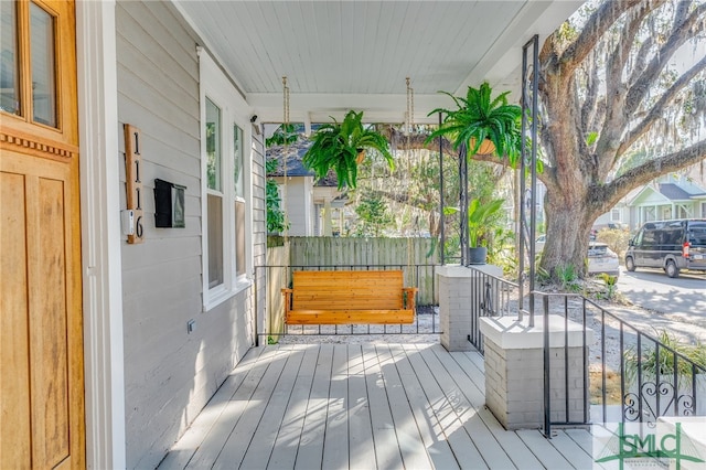 deck featuring a porch