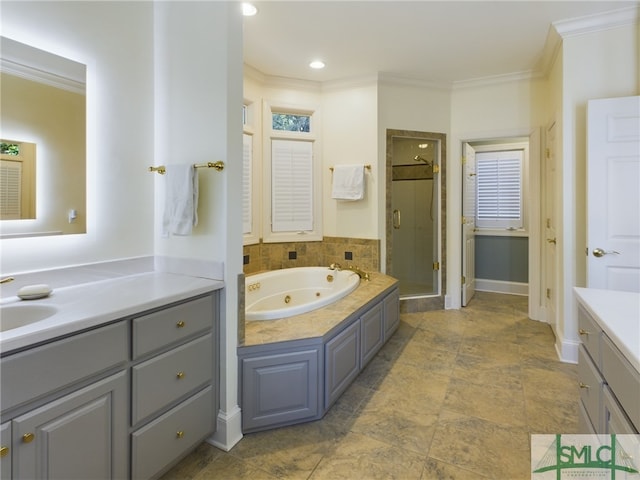 bathroom with vanity, ornamental molding, and plus walk in shower