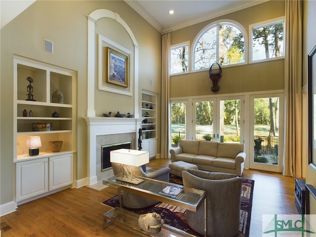 sunroom featuring a fireplace