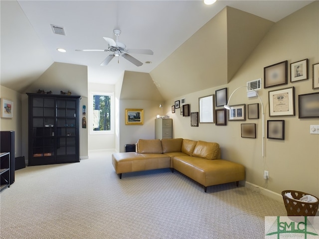 carpeted living room with vaulted ceiling and ceiling fan