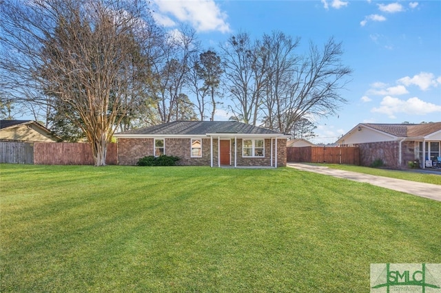 ranch-style house featuring a front lawn