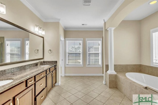 bathroom with ornate columns, vanity, a relaxing tiled tub, crown molding, and tile patterned floors