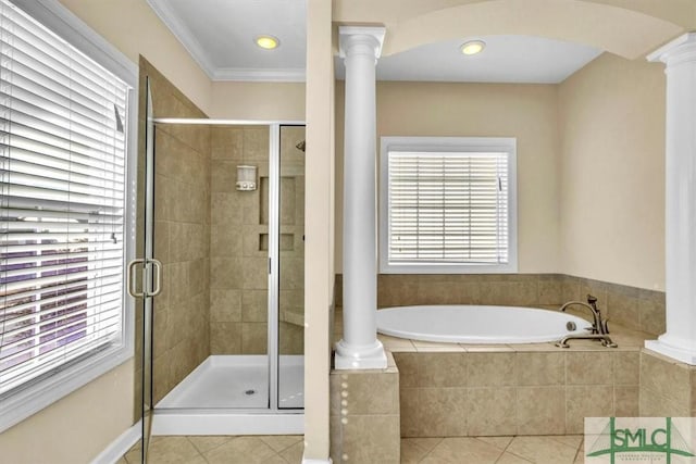 bathroom featuring decorative columns, shower with separate bathtub, ornamental molding, and tile patterned floors