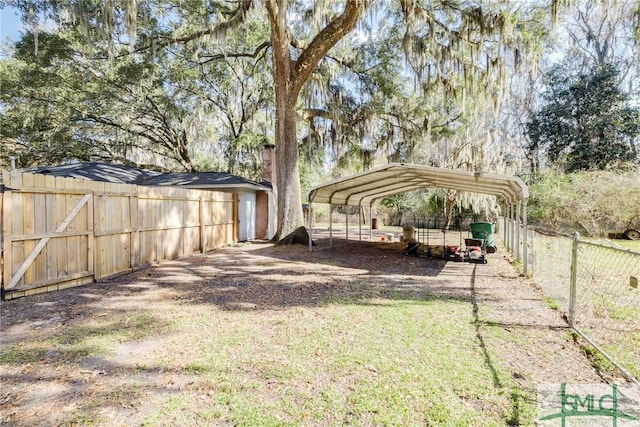 view of yard featuring a carport