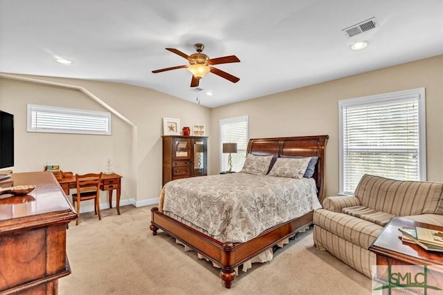 carpeted bedroom featuring ceiling fan and lofted ceiling