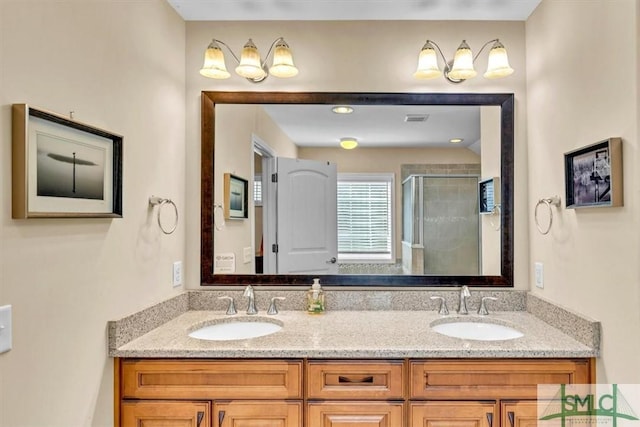 bathroom with an enclosed shower and vanity