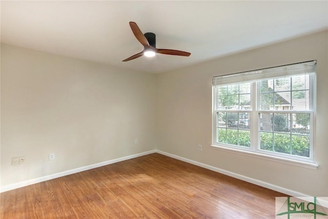 unfurnished room with ceiling fan and light hardwood / wood-style flooring