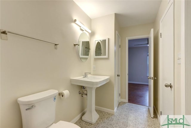 bathroom featuring toilet