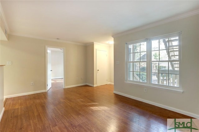 unfurnished living room featuring crown molding and hardwood / wood-style floors