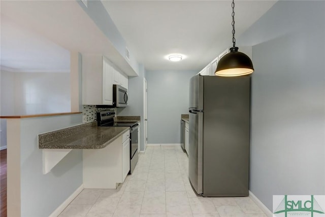 kitchen with white cabinetry, tasteful backsplash, hanging light fixtures, dark stone countertops, and stainless steel appliances