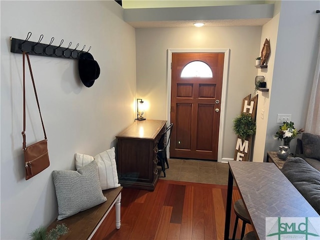 foyer featuring dark hardwood / wood-style floors