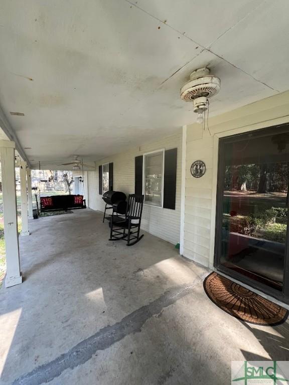 view of patio featuring a porch