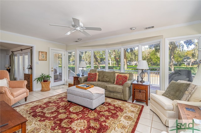 sunroom with ceiling fan and a healthy amount of sunlight