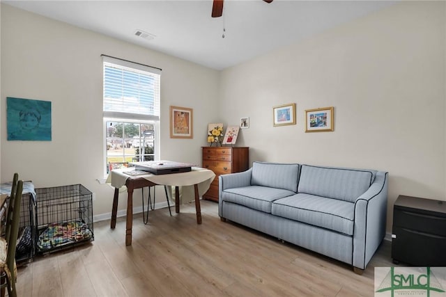 interior space featuring ceiling fan and light wood-type flooring