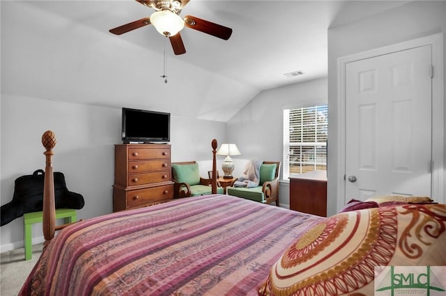 carpeted bedroom with lofted ceiling and ceiling fan