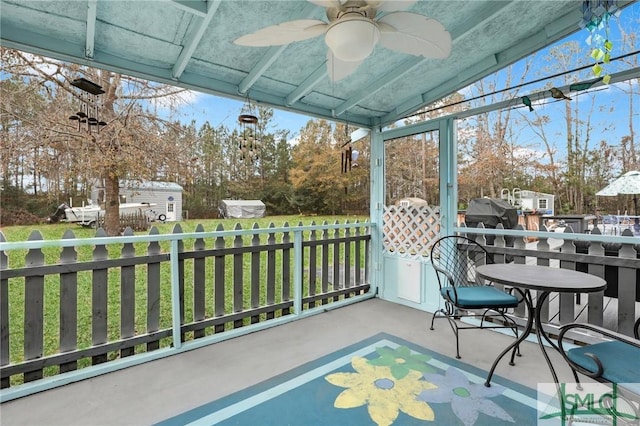 balcony featuring area for grilling and ceiling fan