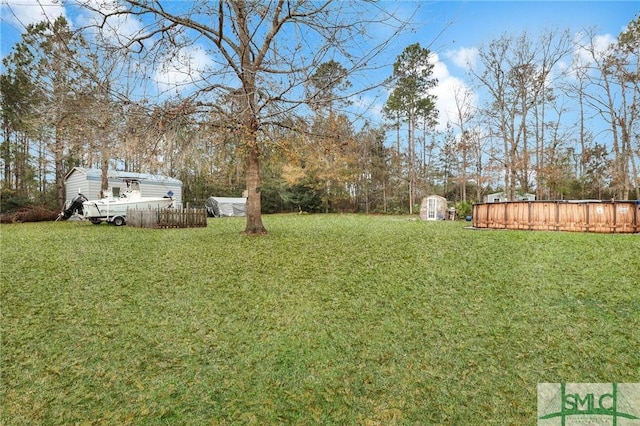 view of yard with a storage shed