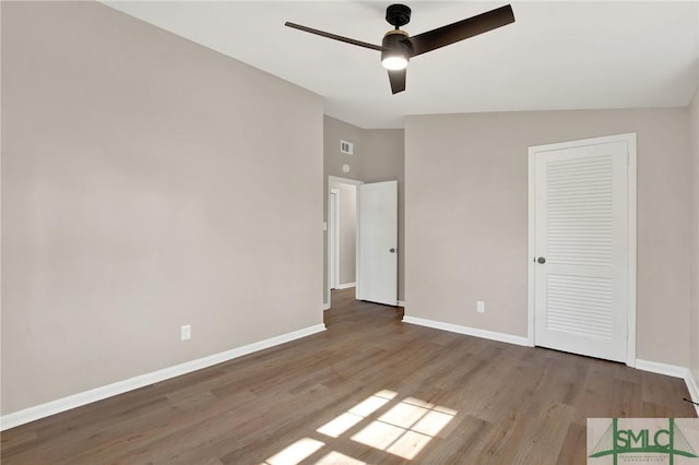 unfurnished bedroom with ceiling fan and light hardwood / wood-style floors