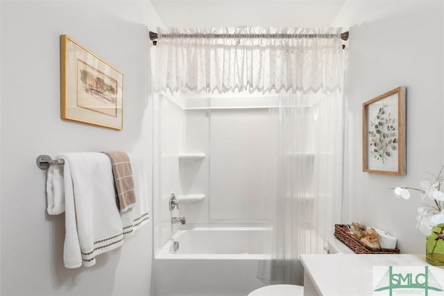 full bathroom featuring vanity, toilet, and washtub / shower combination