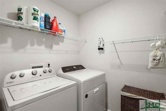 laundry area featuring washing machine and dryer