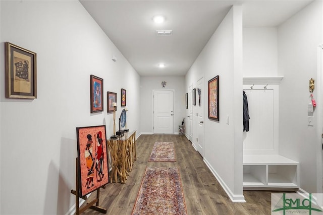 hallway featuring dark hardwood / wood-style floors