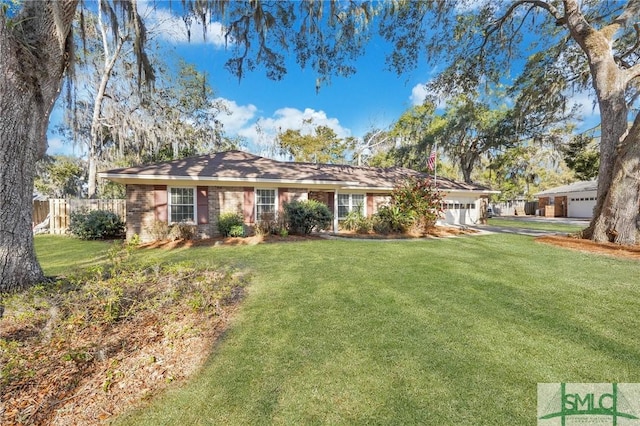 single story home with a garage and a front lawn