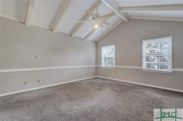 carpeted empty room with lofted ceiling with beams and ceiling fan