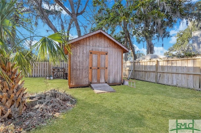 view of outdoor structure with a lawn