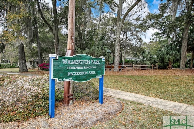 view of community featuring a yard