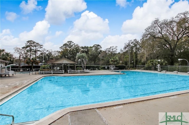 view of pool featuring a gazebo and a patio area