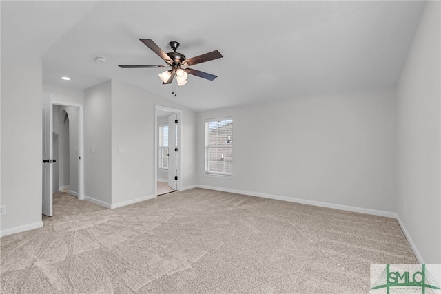 carpeted empty room with ceiling fan