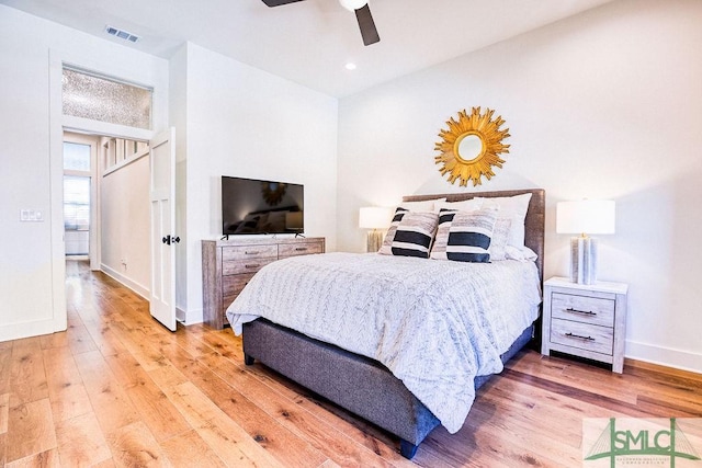 bedroom featuring ceiling fan and wood-type flooring