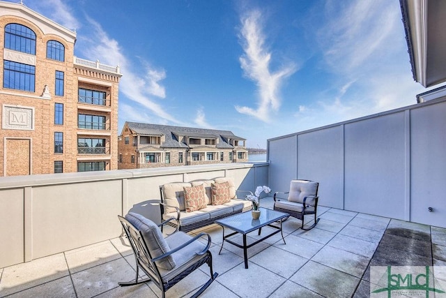 view of patio / terrace with outdoor lounge area and a balcony