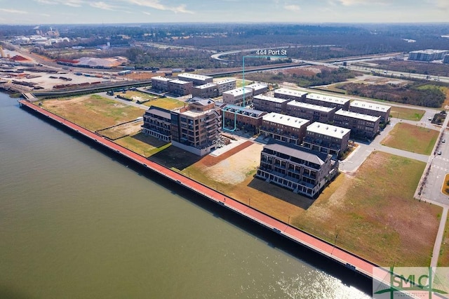 birds eye view of property featuring a water view