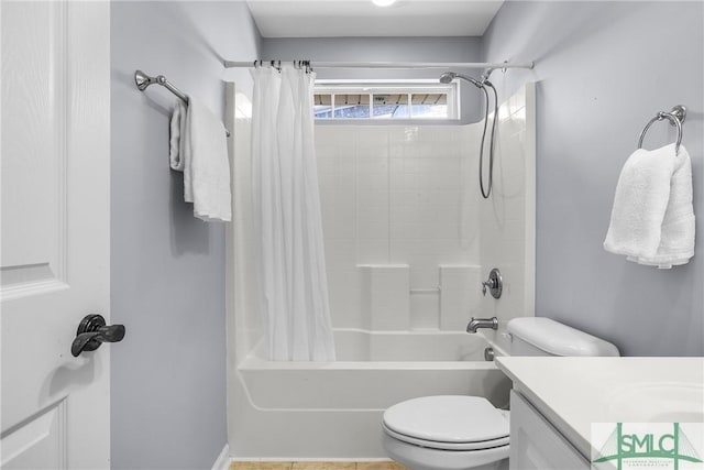 full bathroom featuring shower / bathtub combination with curtain, vanity, and toilet