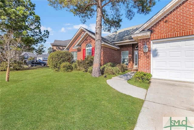 view of front of home with a garage and a front lawn