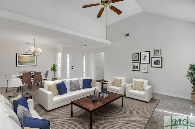 living room with ceiling fan with notable chandelier and high vaulted ceiling