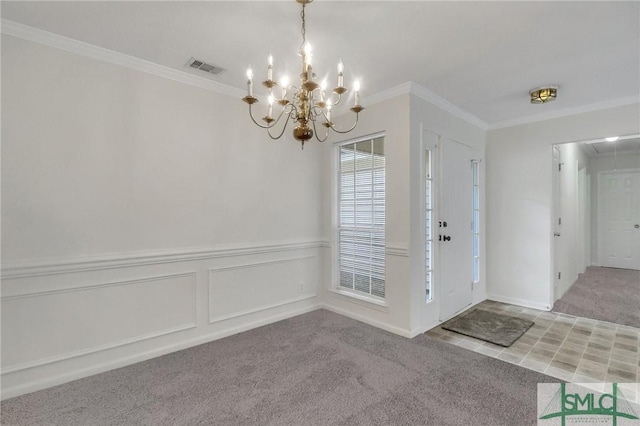 carpeted foyer entrance with crown molding