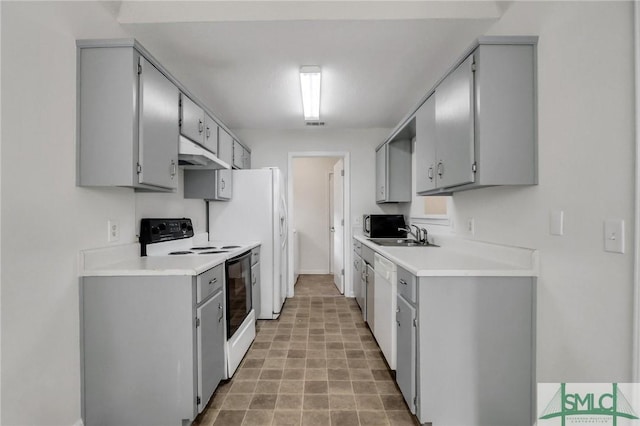 kitchen featuring gray cabinets, dishwasher, electric range oven, and sink