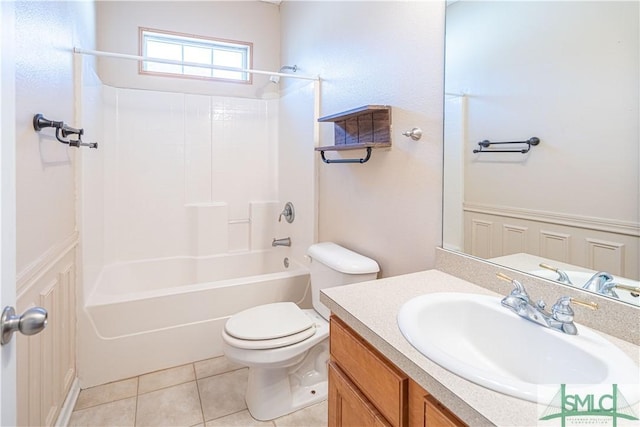 full bathroom featuring tile patterned flooring, vanity, shower / bathing tub combination, and toilet